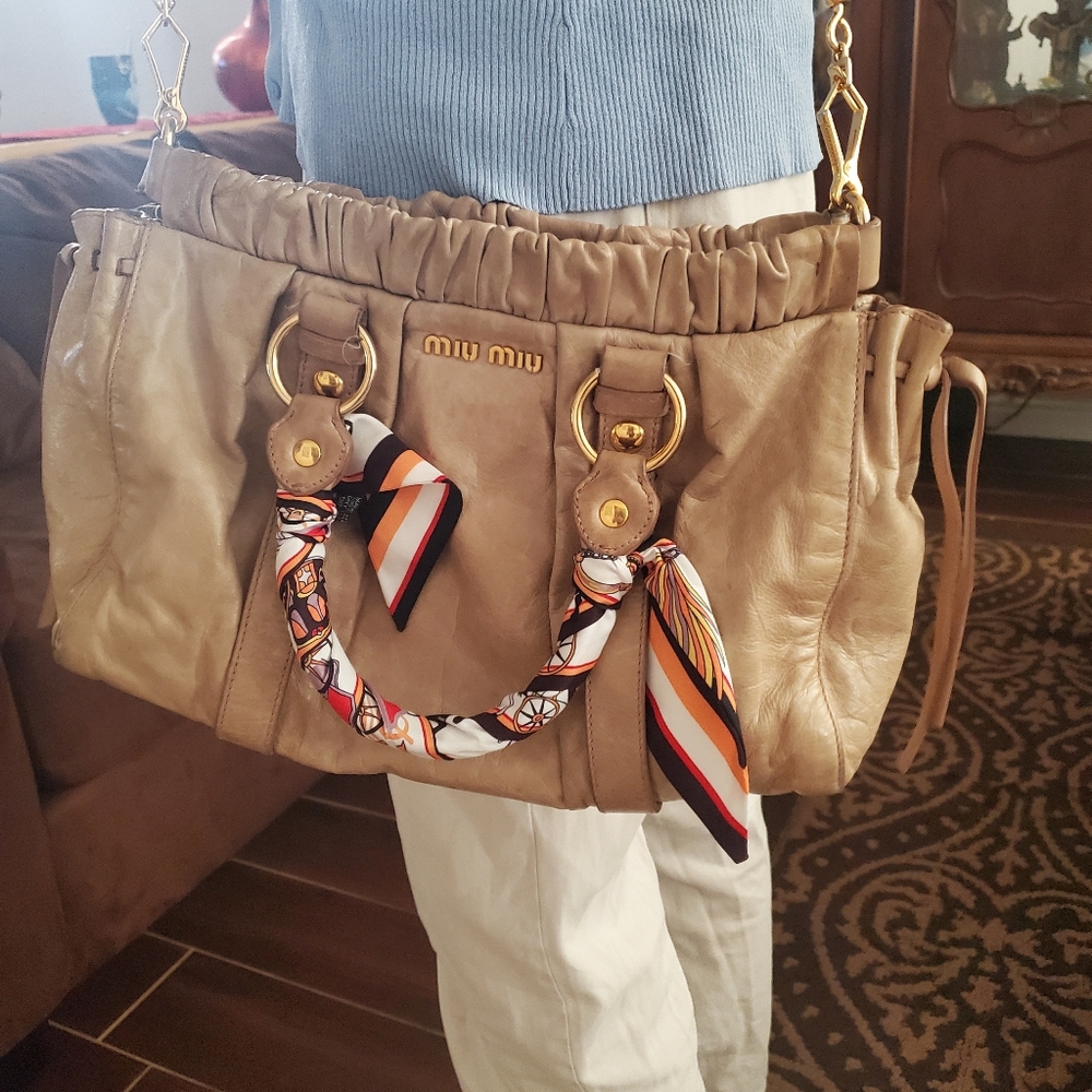100% Authentic Miu Miu.